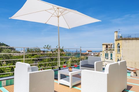 Exclusive Apartment, Partial Sea View | Terrace/patio