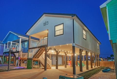 Charming exterior of your elevated beach house.