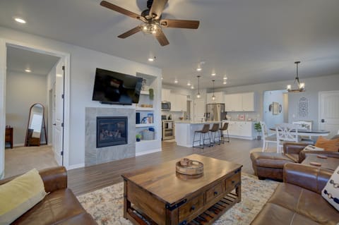 Hardwood floors and an open-concept layout that flows seamlessly from kitchen to living room