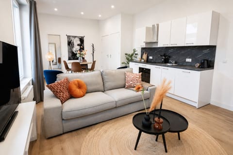 A bright, stylish open-plan living space where modern comfort meets cozy elegance ✨