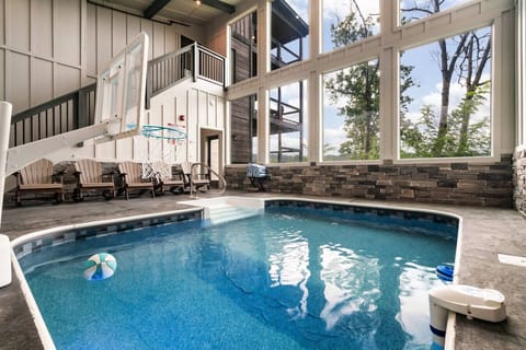 Let the fun continue rain or shine in your private indoor pool. With mountain views through floor-to-ceiling windows and a basketball hoop ready for friendly competition, this space is made for memory-making.