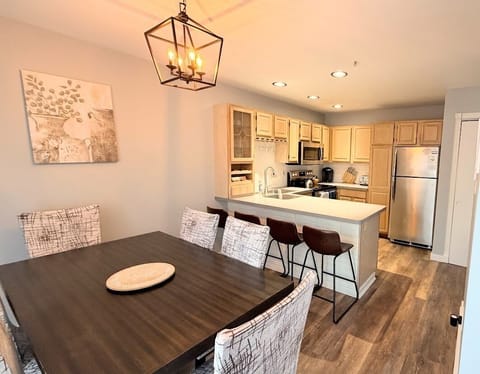 Open-concept kitchen and dining area with plenty of seating for everyone. 
