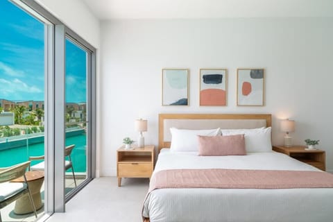 Wake to turquoise views and sink into hotel-soft bedding.
