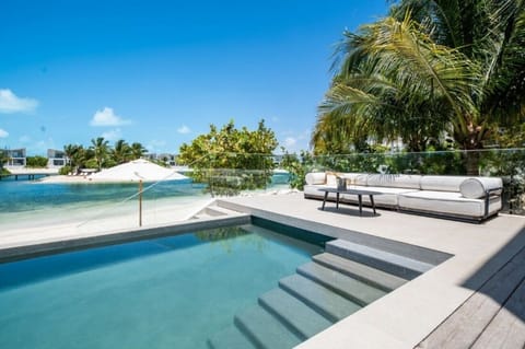Soak in serene lagoon views from your private pool terrace.