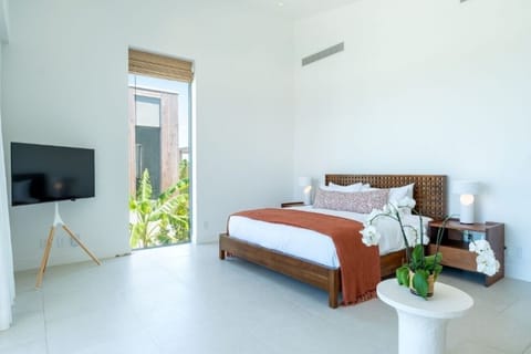 Recharge in a serene suite with crisp linens and calm light.
