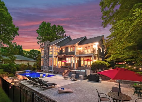 Welcome to Boathouse Cove! Lakefront backyard at Boathouse Cove with pool and separate hot tub!