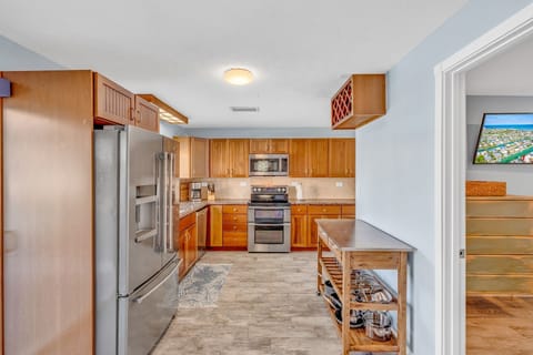 Fully equipped modern kitchen with stainless steel appliances and ocean views in Key Colony Beach Florida Keys.