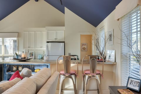 Unwind at the kitchen counter with comfortable seating options.