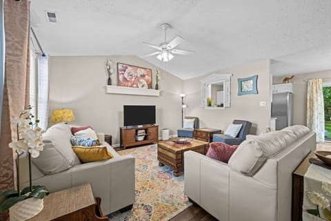 Each living room features comfortable leather sofas and smart TV.