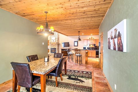 The open-concept dining area flows seamlessly from the kitchen, making group meals a breeze.