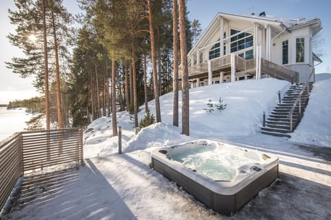 Enjoy a private, warm soak in the lakeside jacuzzi after a long day on the Tahko ski slopes.