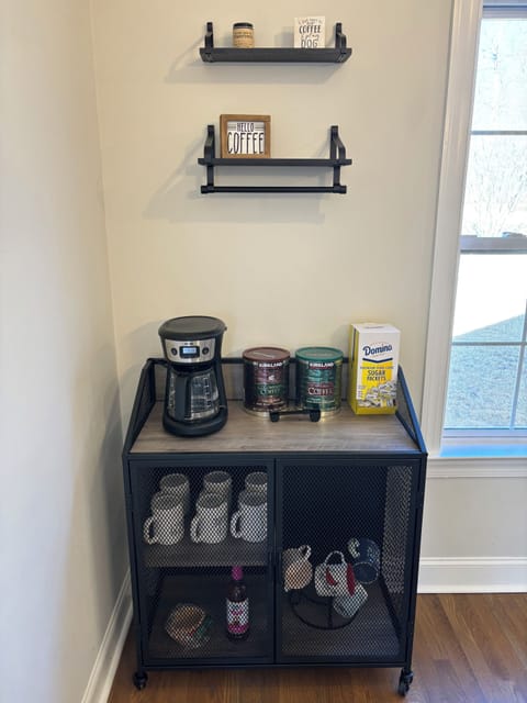 Coffee station with regular and decaf coffee provided