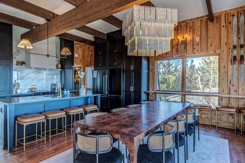 Dining area seats 20. 10 at the dining table and 10 at adjacent bar areas.