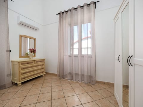Comfort Apartment, Balcony, Garden View | Down comforters, blackout drapes, iron/ironing board, travel crib