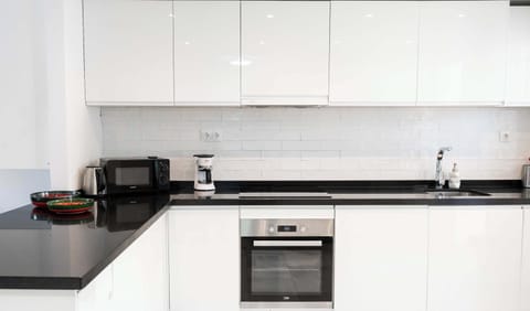 The kitchen is modernly furnished with a Scandinavian touch ensuring full comfort for all your daily meals