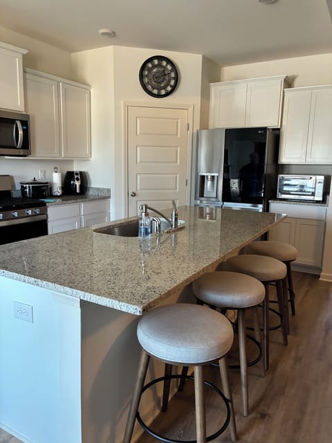 Island with four barstools