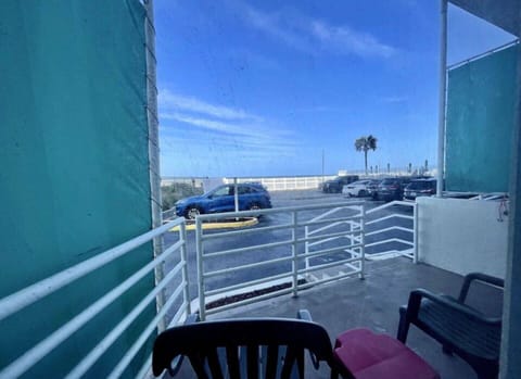 A welcoming entrance with convenient access and a clear view of the parking area.