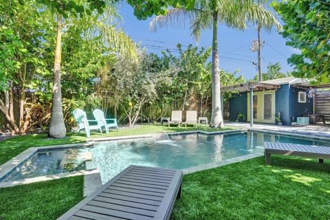 Tropical oasis with pool, spa, and lounge areas  perfect for relaxing.
