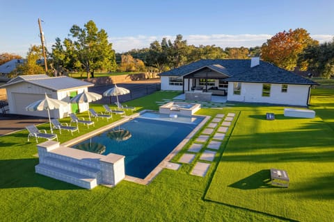 Private pool, hot tub, and deck with sun loungers