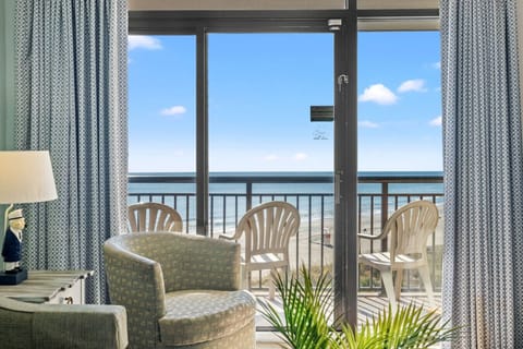Direct Oceanfront view from the Living room brings energy and excitement as the sunrises on your vacation day.