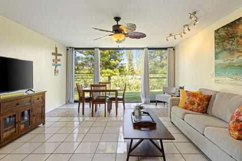 Bright living area opening to greenery, perfect for laid-back hangs.