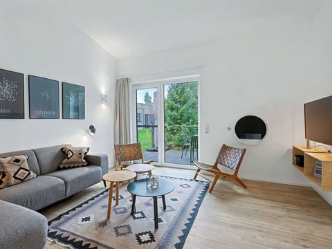 Furniture, Interior Design, Flooring, Floor, Wood, Couch, Wood Flooring, Living Room, Room, Chair