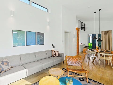 Furniture, Interior Design, Flooring, Floor, Wall, Couch, Wood, Living Room, Wood Flooring, Ceiling