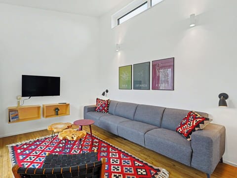 Furniture, Interior Design, Flooring, Floor, Wall, Couch, Living Room, Wood, Ceiling, Wood Flooring