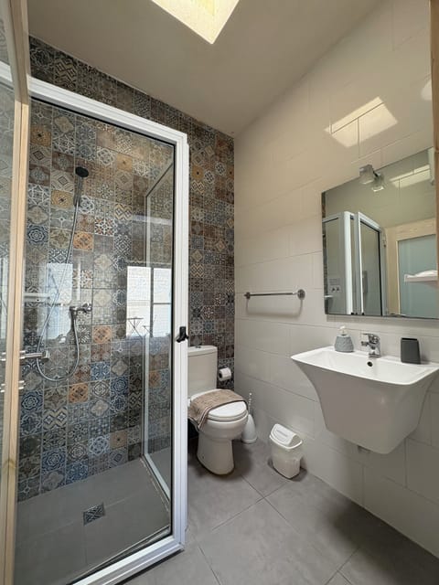 Standard Double Room, Balcony, Pool View | Bathroom | Shower, hair dryer, slippers, towels