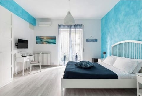 Family Quadruple Room, Balcony | Blackout drapes, soundproofing, iron/ironing board, free WiFi
