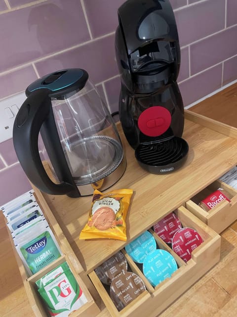 Enjoy your favourite hot drink with pod coffee machine, decaf coffee and selection of herbal teas