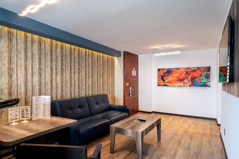 32-inch flat-screen TV with cable channels, TV