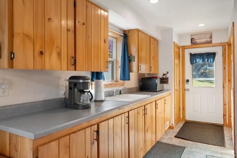 Fully Equipped Kitchen | Wood Cabinets, Modern Appliances & Forest Views