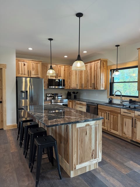 Elegant kitchen with all of the modern appliances and amenities. 