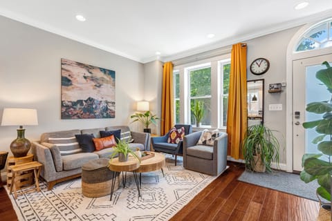 Drop the bags, sink into the sectional, and let the group spread out: this brigh