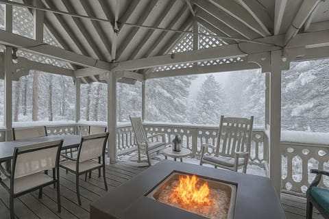 The large gazebo offers outdoor space with a fire pit and lots of seating.