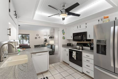 [Kitchen] ~ High-end appliances, Full size fridge with ice maker, Stove, Oven, Microwave, Blender, Toaster, Mixer, Dishware, flatware, and dining utensils