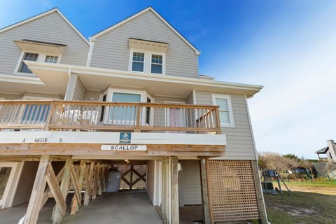 New to Seaside for 2026 – Charming Buxton townhouse with ocean views and a screened deck.