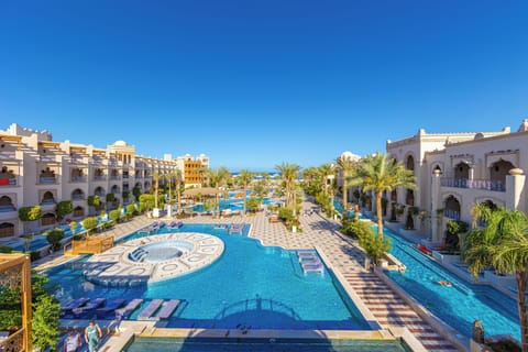 Outdoor pool, open 10:00 AM to 5:00 PM, pool umbrellas, sun loungers