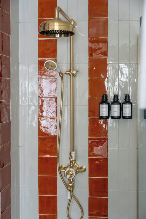 Signature Double Room | Bathroom | Hair dryer, slippers, towels, soap