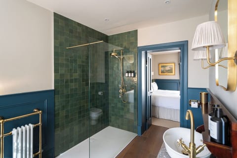 Superior Double Room | Bathroom | Hair dryer, slippers, towels, soap