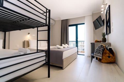 Basic Quadruple Room, Sea View | In-room safe, individually furnished, blackout drapes