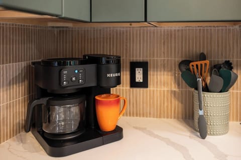 Bright,  new modern kitchen with all new appliances, a gas stove, and everything you need to cook and gather. Whether you are making a big family breakfast or a cozy dinner in, this space is ready for it all.