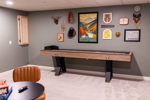 Ready to unwind? Our Game Room has something for everyone. Play a tournament on the shuffleboard table, try out the arcade games, or just relax by the warmth of the electric fireplace. A Smart TV for movie. 