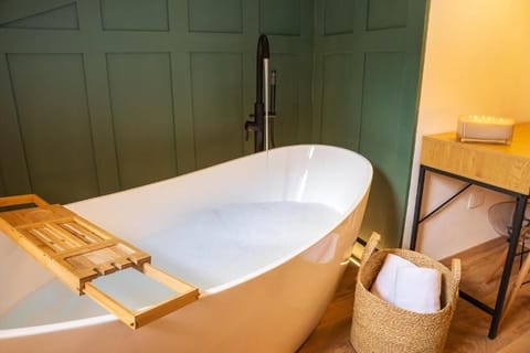 Deluxe Triple Room, Mountain View | Minibar, in-room safe, blackout drapes, free WiFi