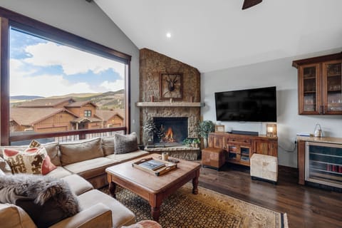 Living Room with large windows and gas fieplace