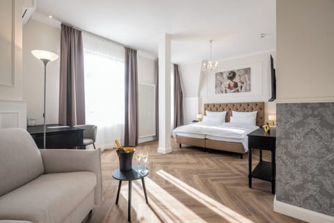 Panoramic Suite, Balcony, River View | Premium bedding, in-room safe, desk, laptop workspace