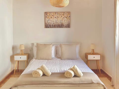 A cozy retreat with a large double bed, high-quality bedding, extra pillows, and blackout blinds. Includes a double wardrobe, air conditioning, and heating for year-round comfort.