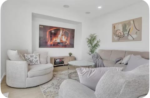 Living room area with 85inch tv