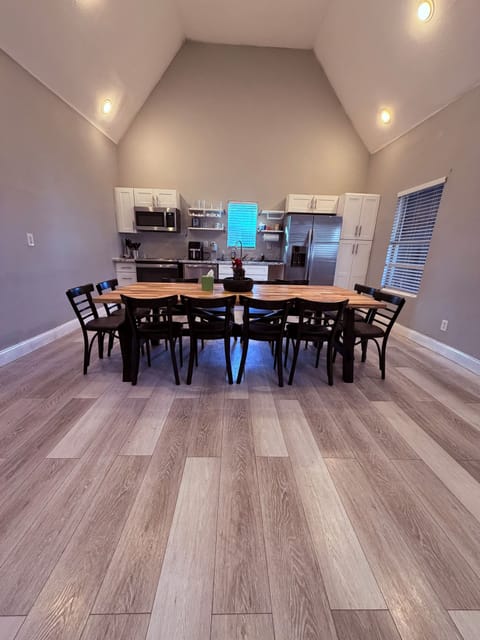 Full kitchen features 16 seat table and cooking essentials